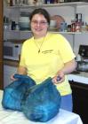 Volunteer Helps Carry Out Bags of Fresh Produce
